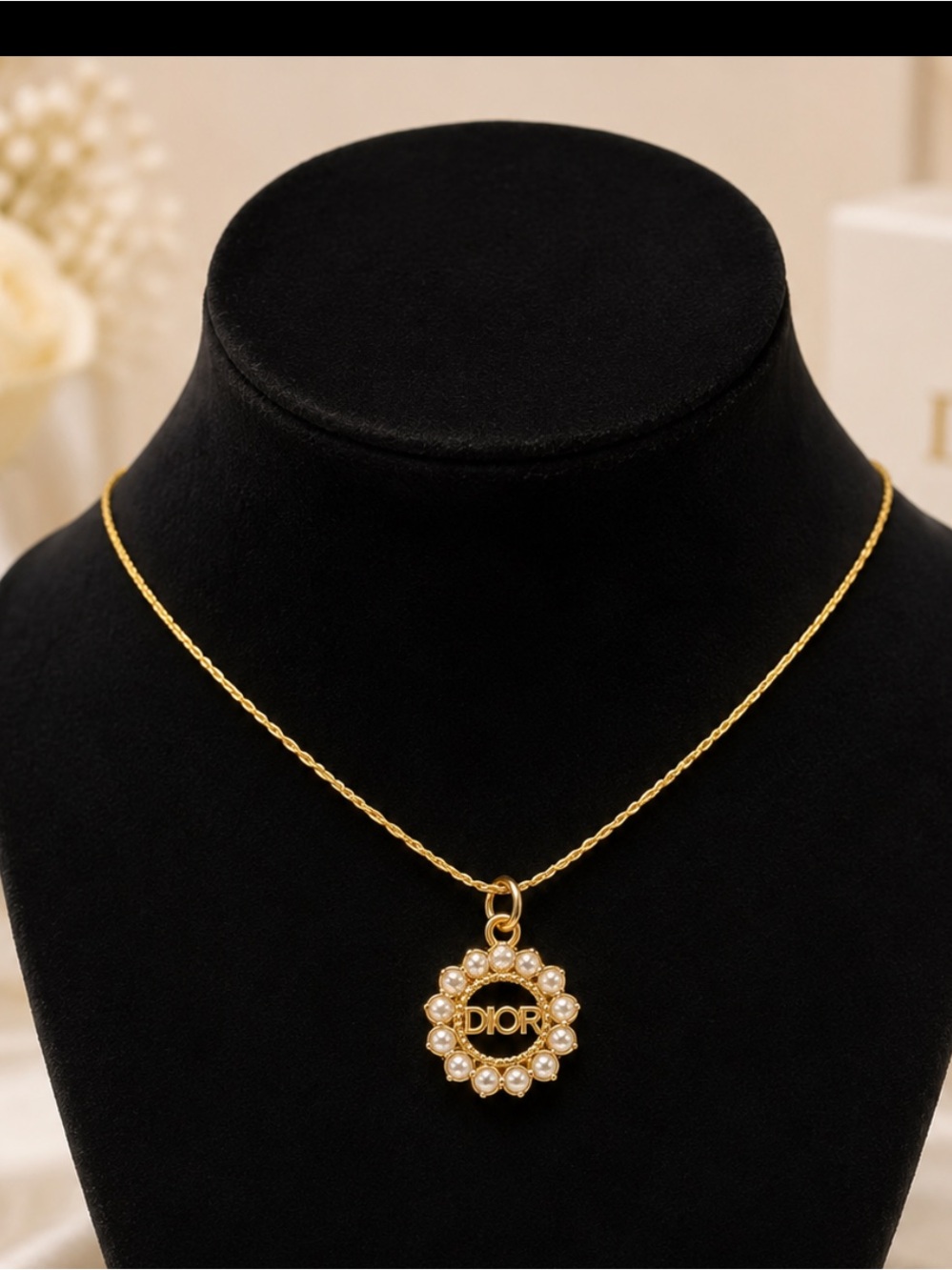 Dior gold and pearl charm necklace